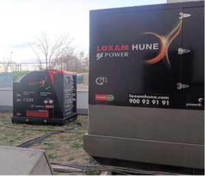 Sistema híbrido de grupo electrógeno más batería para edificio de viviendas